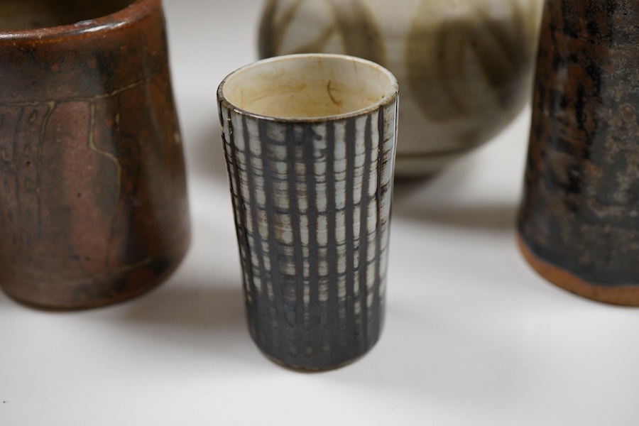 Assorted studio pottery comprising six vases and a goblet, largest 15cm high